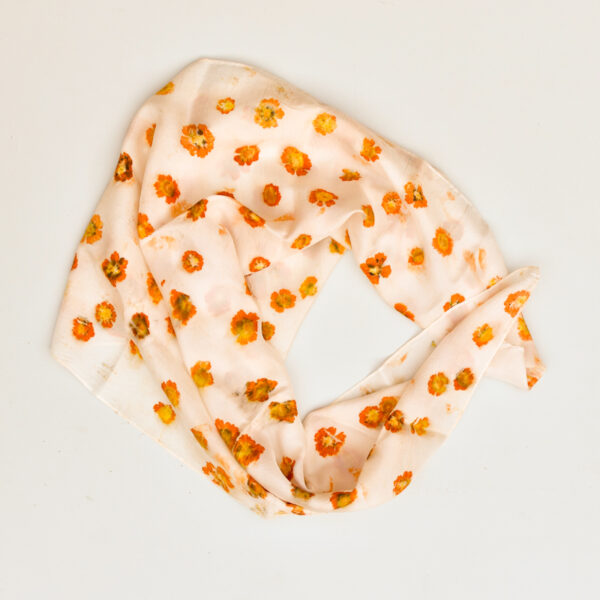 silk scarf draped into circlle, clear images of orange coreopsis flowers