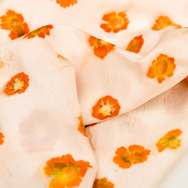 rumpled silk scarf with close up of orange coreopsis flowers