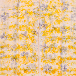 large silk square scarf with scattered yellow and purple, and petal images on white background. made with natural dye technique
